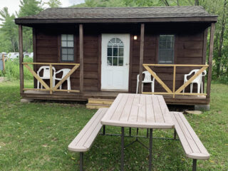 exterior of cabin with picnic table
